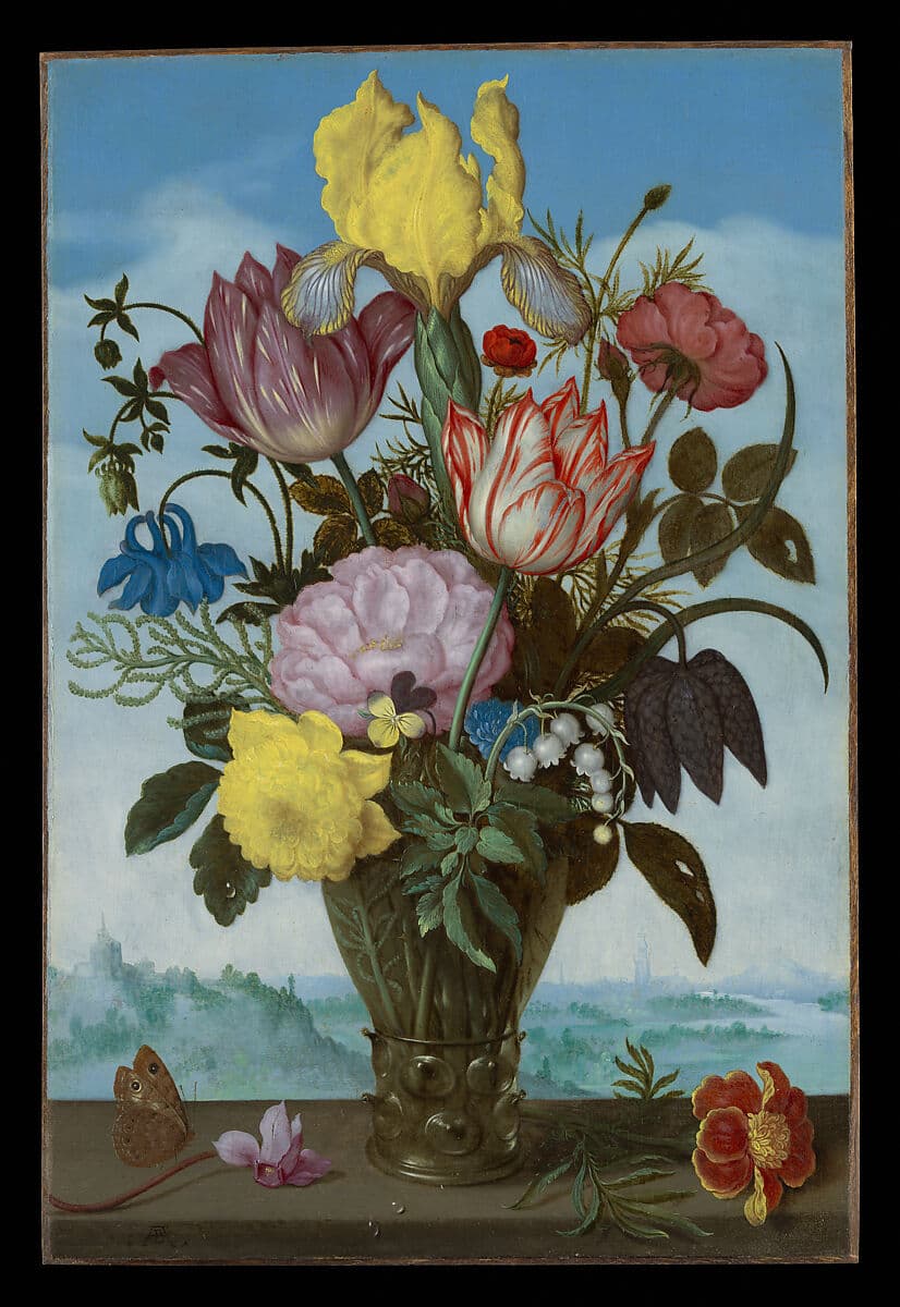 still life with flowers and blue background